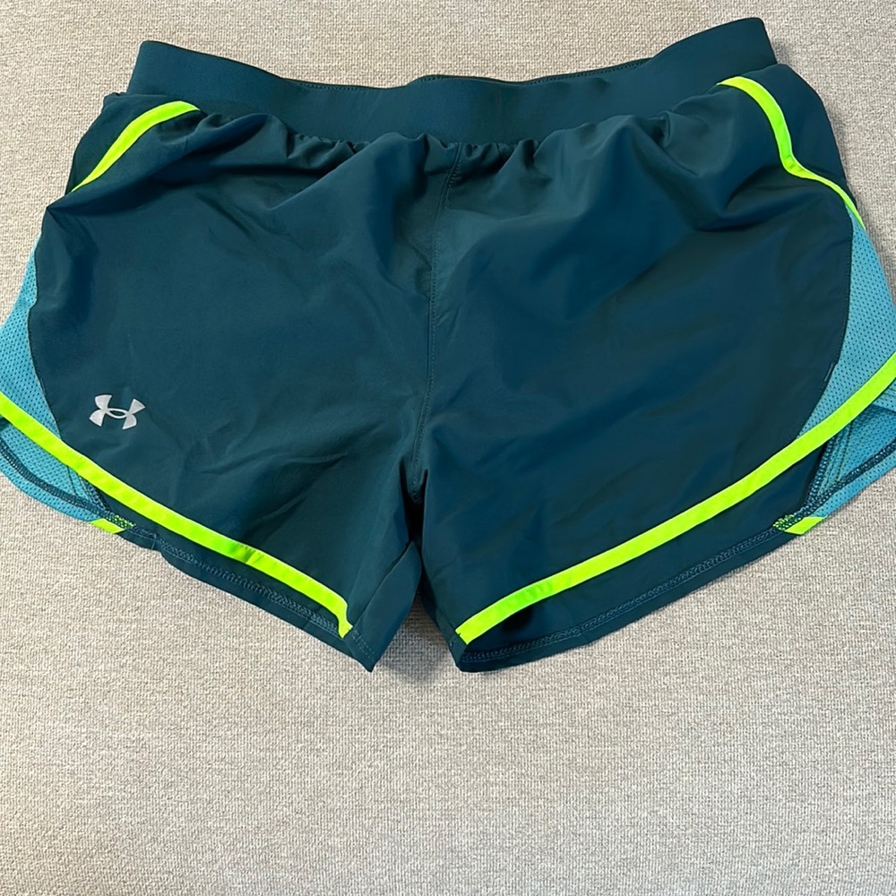 Under Armor running shorts, size Medium